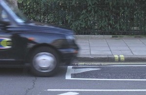 Front of London taxi in parking area