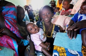 Image of families receiving testing and counselling for HIV in the Gambia through the Global Fund