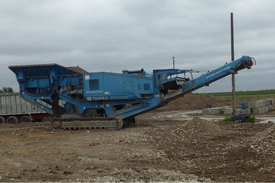 Heavy crushing machinary on farm in Hertfordshire