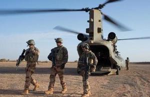 Troops on the ground in Mali after disembarking from their helicopter.