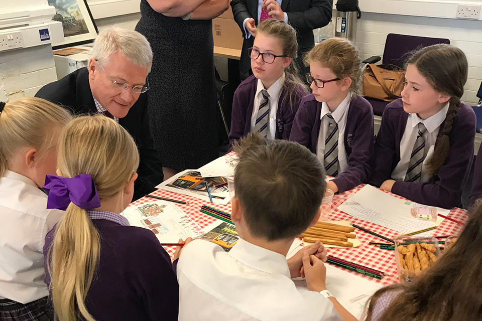 Andrew Jones with school children 