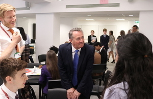Liam Fox with students
