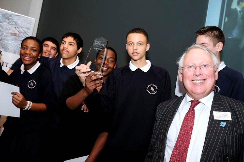 Bob Neill with school children