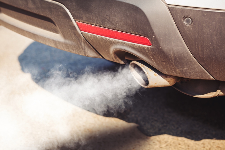 detail of a car exhaust and fumes