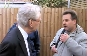 Andrew Stunell with a homeless man