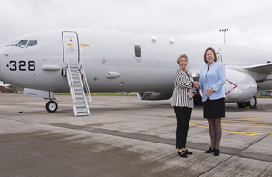 Defence Minister Anne-Marie Trevelyan and Norwegian State Secretary Tone Skogen standing in front of a P8 aircraft