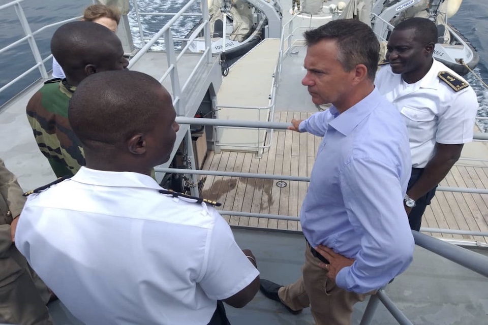 Minister for the Armed Forces Mark Lancaster watches a demonstration of Senegalese Marine Capabilities