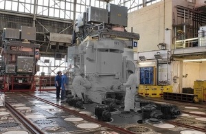 Then and now merged image of the charge floor in Calder Hall