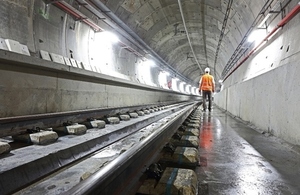 workman in a rail tunnel