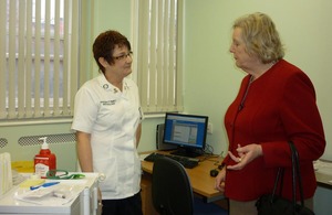 Baroness Hanham with a nurse in the blood testing unit