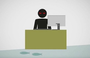 Fraudster using a computer