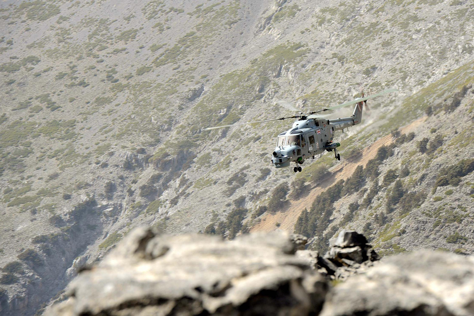 HMS Dragon's Lynx helicopter conducting mountain flying training