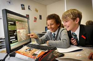 School children in front of a PC