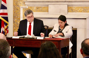 Home Secretary Priti Patel signing the UK-US Data Access Agreement