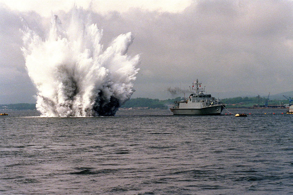 HMS Pembroke destroying a mine.