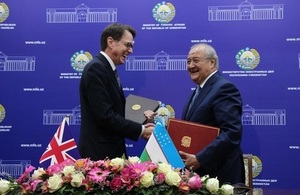 Her Majesty’s Ambassador to Uzbekistan Tim Torlot shaking hands with Uzbek Foreign Minister Abdulaziz Kamilov in Tashkent.