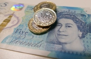 Image of banknote and pound coins