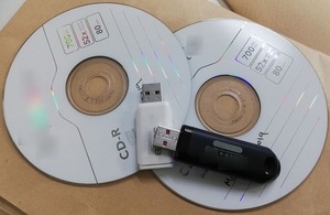 USB stick and CDs for storing media files