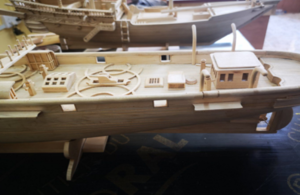 Model ships being prepared