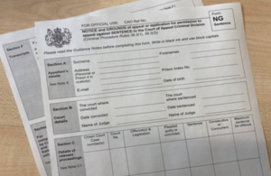 HMCTS Forms NG on table