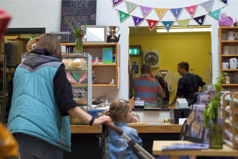 Photo of a woman and her child in the Talking Shop in Sandford-on-Thames, Oxfordshire