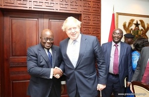 An image of H.E. Nana Akufo Addo, President of Ghana shaking hands with British PM Boris Johnson