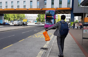 Boy stopping a bus