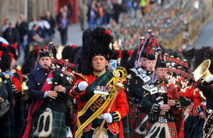 The Band of the Royal Regiment of Scotland and 1st Battalion The Royal Regiment of Scotland's Pipes and Drums lead the homecoming parade through Edinburgh [Picture: Mark Owens, Crown copyright]