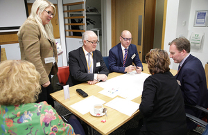 Group shot of stakeholders at meeting