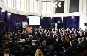 The Inaugural Strategic Command RUSI Conference with a military commander speaking at a podium in front of a seated audience.