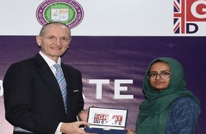 The British Deputy High Commissioner Karachi and Trade Director for Pakistan Mike Nithavrianakis with Hafsa Tahir – winner of the GREAT Debate in Karachi.