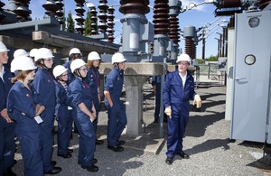 teenagers with hardhats at national grid