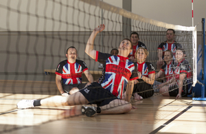 Members of the UK Team participating in next month's US Warrior Games practice their sitting volleyball techniques.