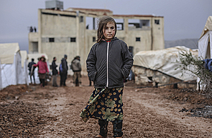 A girl in an informal tented settlement close to the Syrian-Turkish border, northwest Syria. Picture: UNICEF/Khlaed Akacha