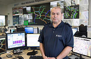 Image showing Frank Bird along colleagues in the control room at the West Midlands Regional Operations Centre.
