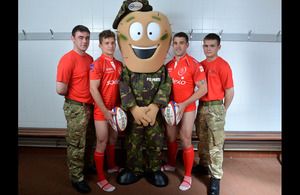 'Private Parts' with members of the British Army rugby team, helping to raise awareness of testicular cancer [Picture: Corporal Steve Blake, Crown copyright]