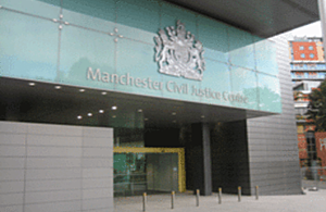 Photograph of entrance to Manchester Civil Justice Centre building
