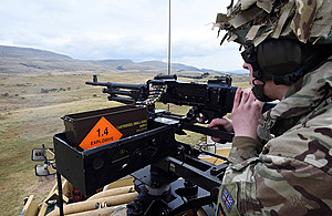 A soldier from the Royal Scots Dragoon Guards live firing on Warcop Training Area in 2015.