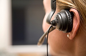 Woman with telephone operator headset