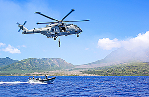 A Royal Navy Merlin helicopter conducts assistance and disaster relief exercises in Montsserat