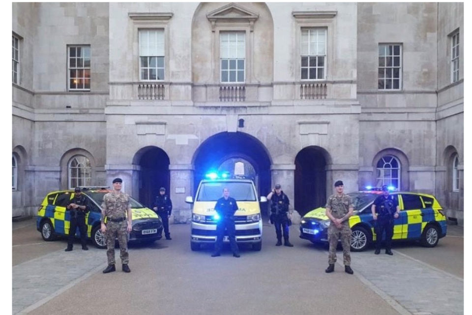 Image of military personnel and Ministry of Defence police at the Clap for our Carers at Whitehall, MDP with colleagues from London Ambulance Service and the British Army, HQ London District.