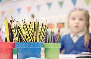 pots-of-pencils-in-a-classroom