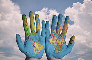 hands-painted-with-a-map-of-the-world