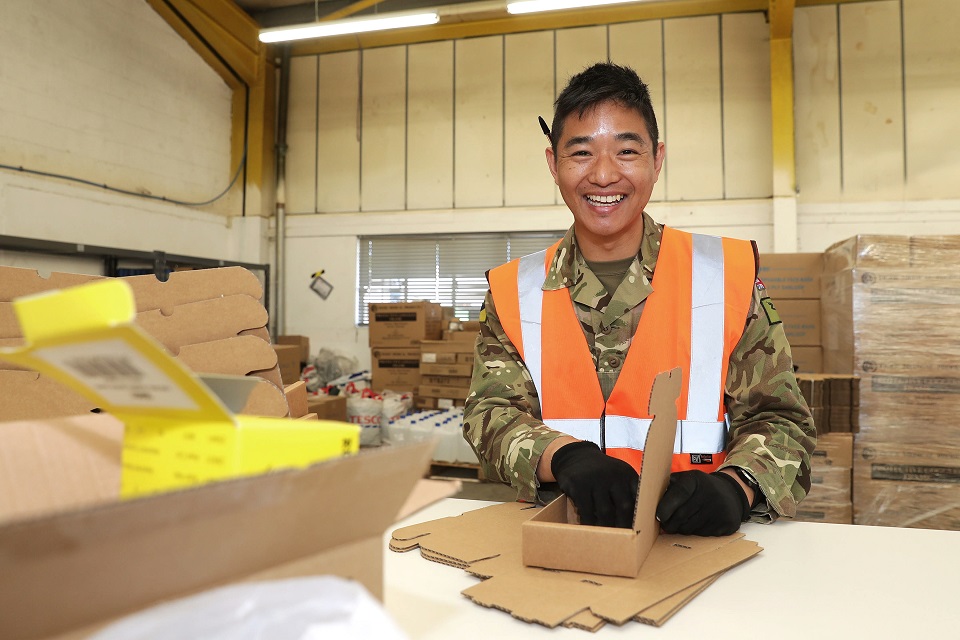 Corporal prepares PPE for local schools. 