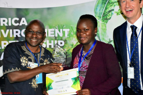 Ken Mwathe, Programme Manager at BirdLife International, receiving an award.