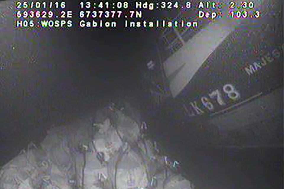 Underwater image showing sandbags against the wreck