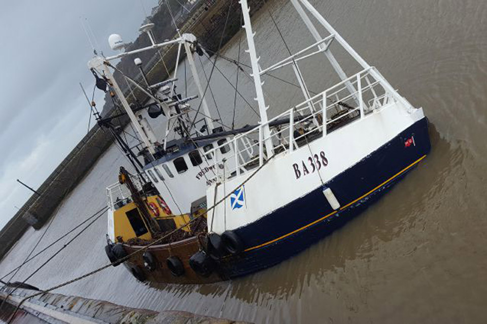 Fishing vessel Fredwood flooded alongside (photograph courtesy of News & Star)
