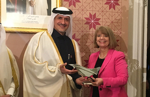 Defence Minister Harriett Baldwin hands a model Typhoon to His Excellency Mr Yousef Ali Al-Khater. Crown copyright.