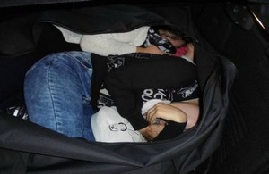people inside a boot of a car.