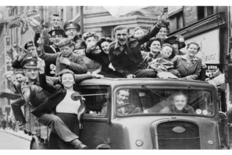 A truck of revellers passing through the Strand, London [Picture: Imperial War Museum HU 41808]